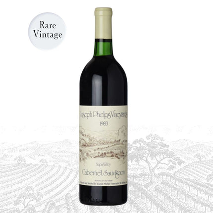 A bottle of Joseph Phelps Vineyard 1983 Cabernet Sauvignon wine, labeled 'Rare Vintage' and 'Wine of the Month', shown against a white background with a faint vineyard illustration.