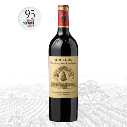 Bottle of Angelus red wine with a James Suckling score label on a white background