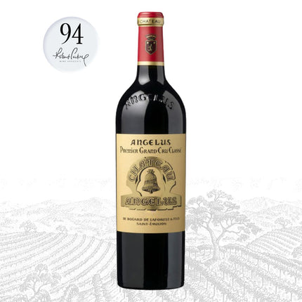 Bottle of Angelus red wine with a gold label on a white background