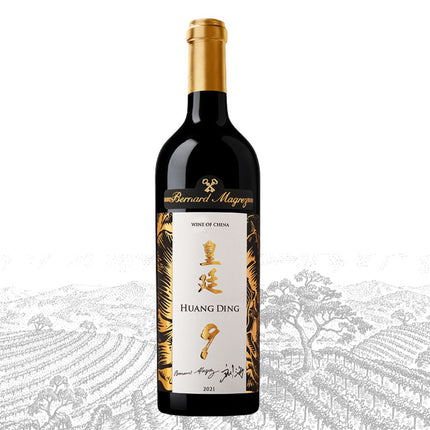 A bottle of Huang Ding wine with a black glass body, gold foil neck, and a white label with gold Chinese characters and the number 9, set against a white background with a faint vineyard illustration.