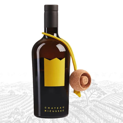 Wine bottle with yellow label and cork on a white background