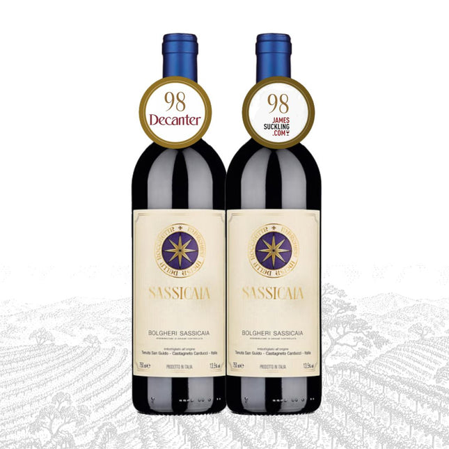 Two bottles of Sassicaia wine with award stickers on a white background